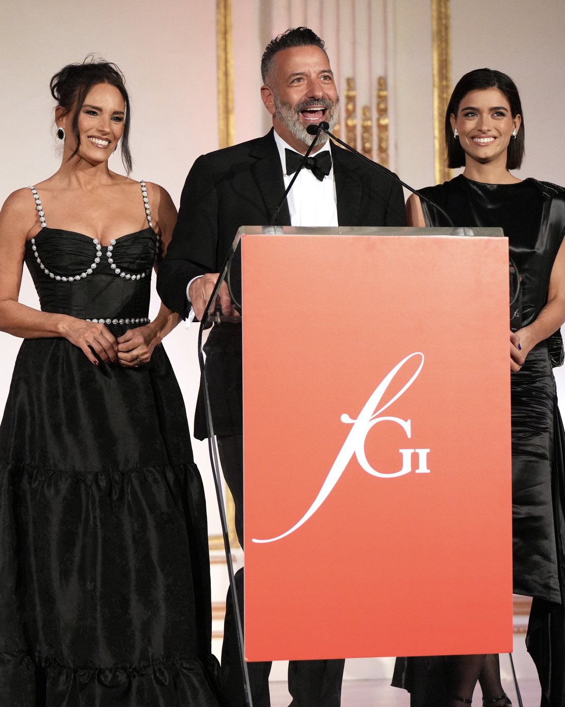 Heidi, Marc, and Dixie D’Amelio presenting at the Fashion Group International gala