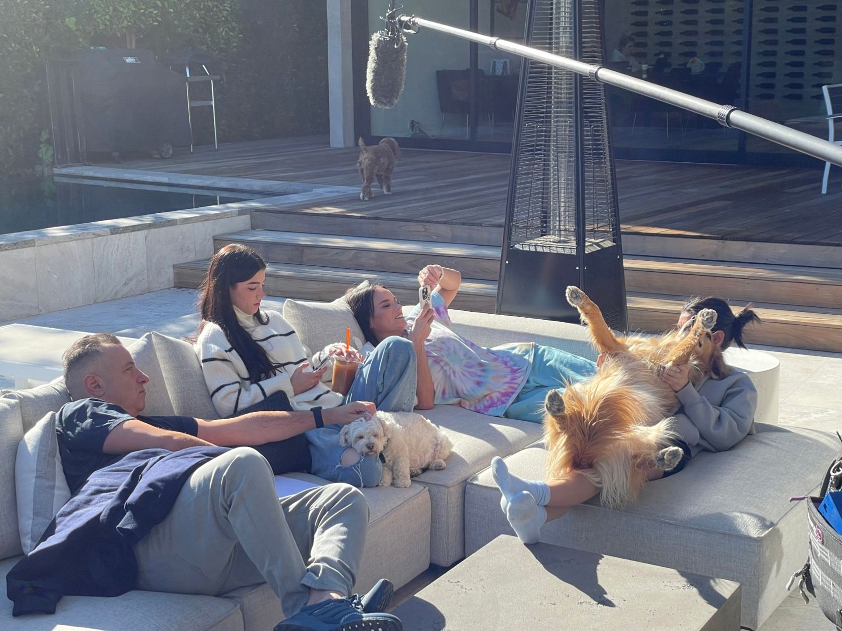 Marc, Charli, Heidi, and Dixie D’Amelio between takes on The D’Amelio Show